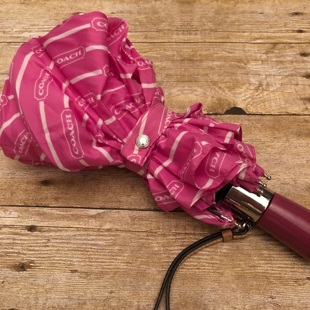 Pink Coach logo umbrella
